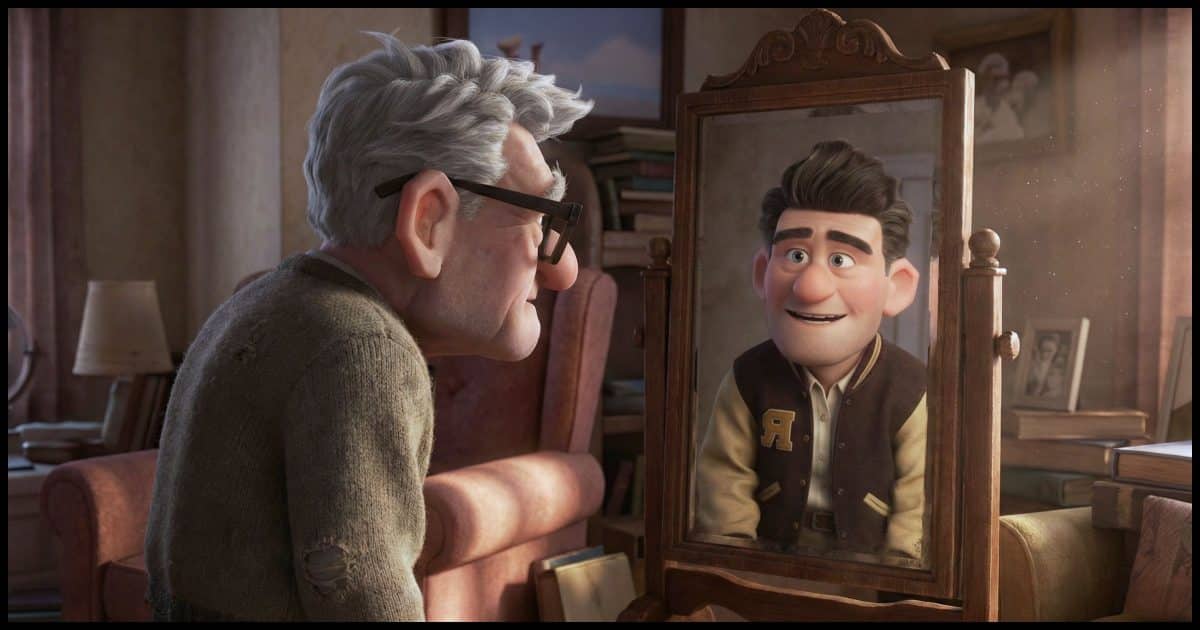 An older gentleman looking into a mirror which reflects his younger self.